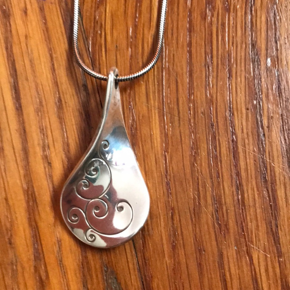 Adjustable silver necklace with large pendant